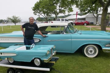 Owner Roland R. Houde poses with his 1958 Edsel, and its mini promo. Only 14 of the minis were made, and just five are still around, according to Houde.