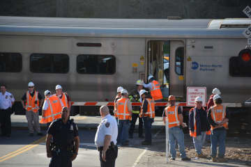 Investigators are at the scene of a grade crossing in Bedford Hills. A train collided with a vehicle at the crossing on Wednesday.