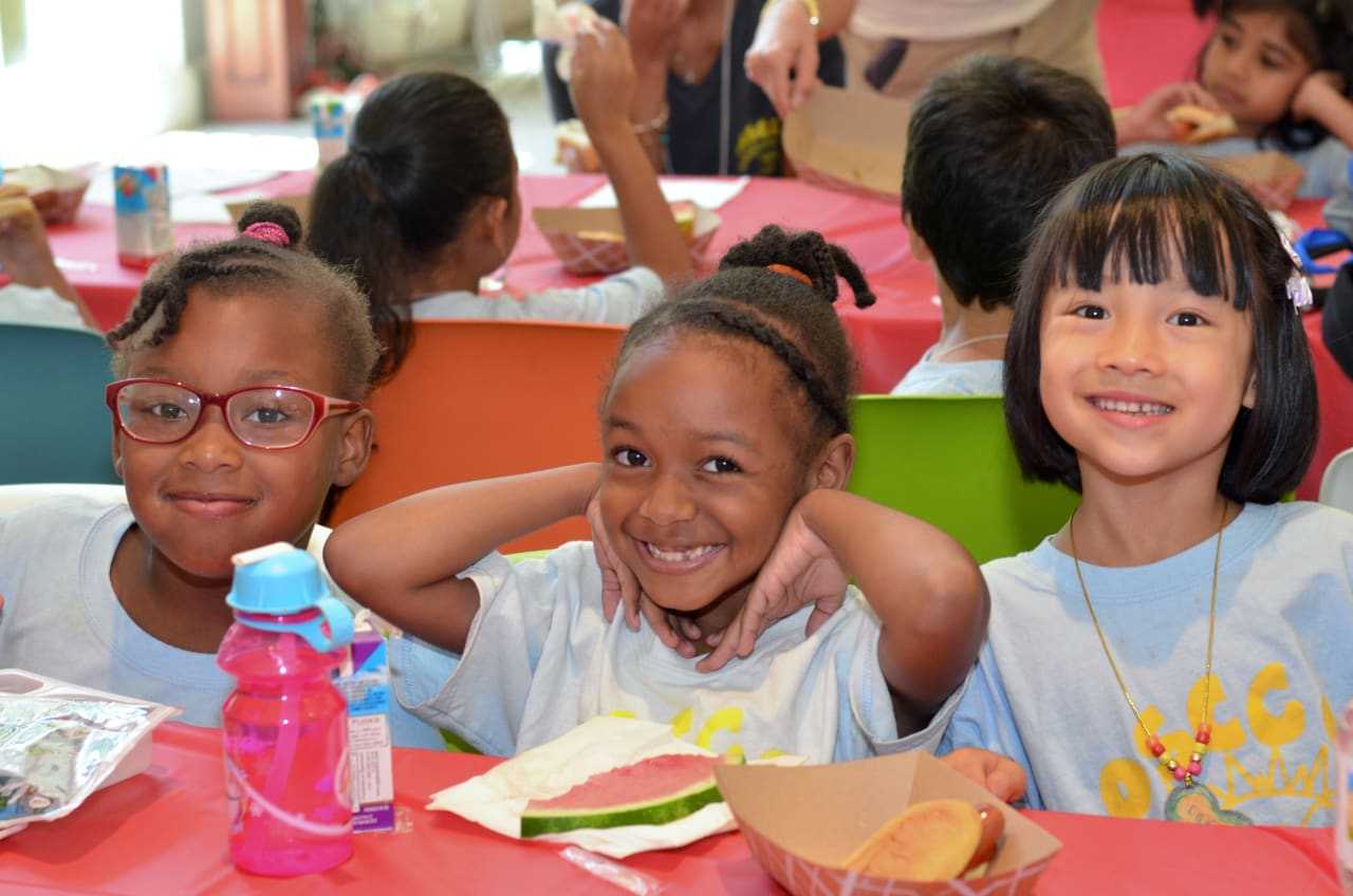 Children enjoy themselves at the annual OPUS Campership Picnic at the Community Center of St. Luke’s parish in Darien.