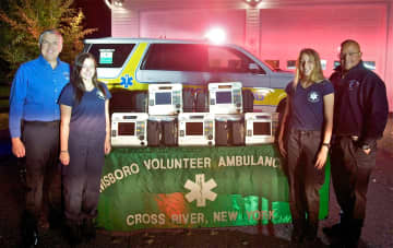 Lewisboro Volunteer Ambulance Corp volunteers with new EKG equipment.