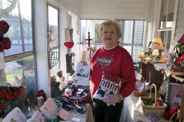 Patsy Costello with items for sale at Costello's Guest House. 