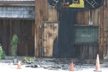 A fire at Daryl's House Club damaged parts of the front wall and the Daryl's House Club sign.