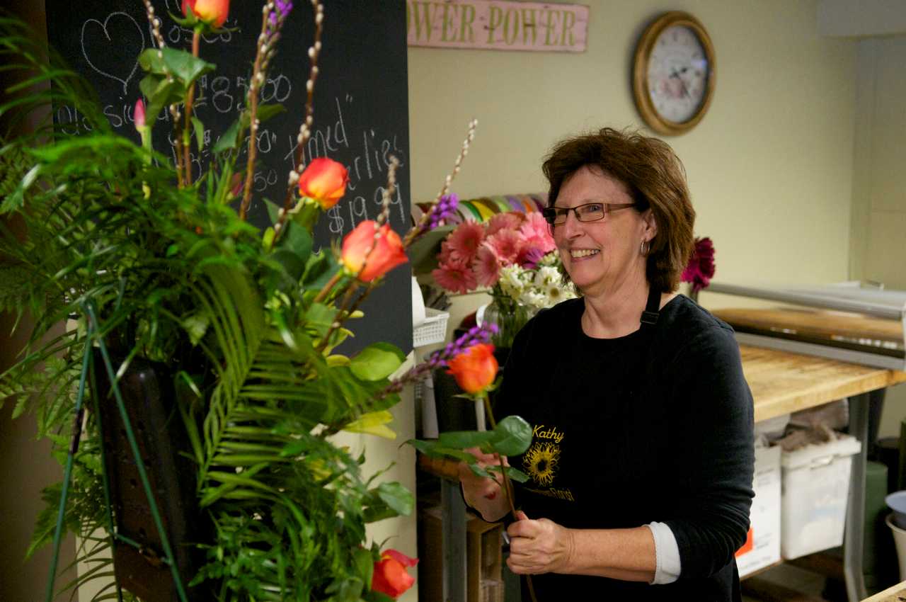 Putting together an arrangement at Newtown Florist.