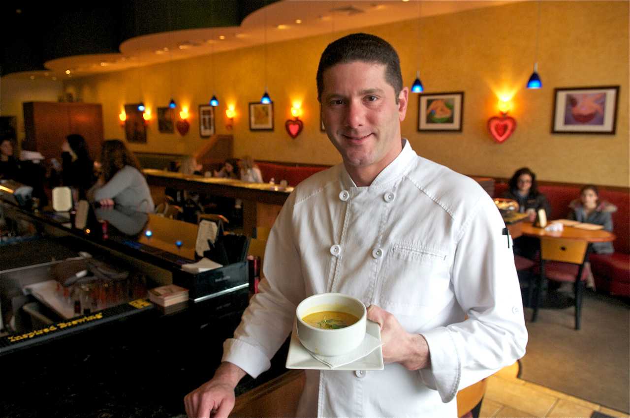 Crew Owner Thomas Kacherski with one of his housemade soups.