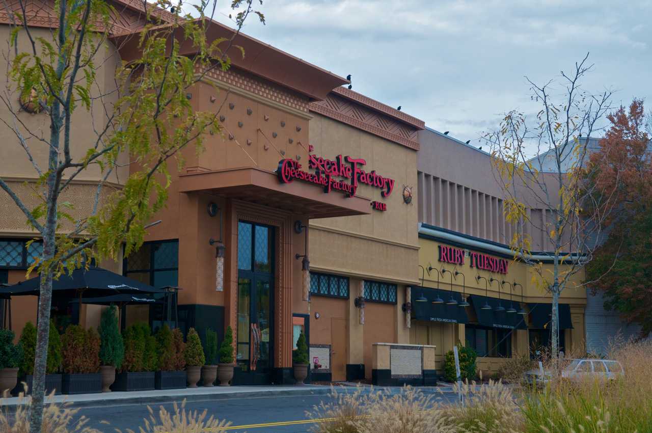 Two people were arrested at the Westfield Trumbull Mall when one allegedly attacked an employee at a mall restaurant.
