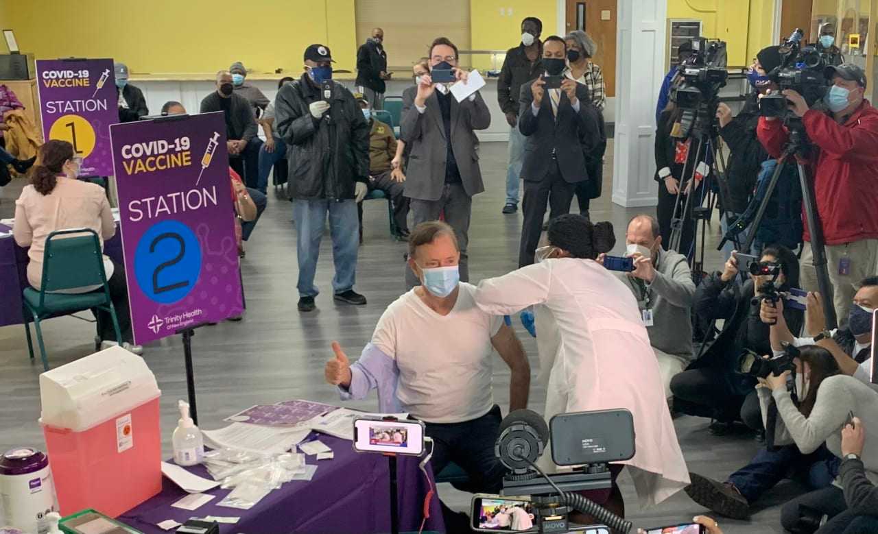Connecticut Gov. Ned Lamont receiving his first dose of the COVID-19 vaccine.