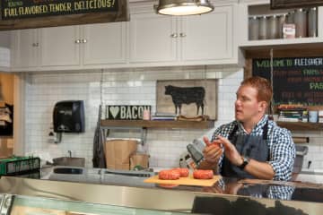 Ryan Fibiger forming burger patties at the Wesport shop: