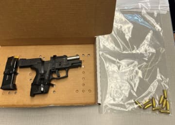 A 24-year-old man with an expired license was found in illegal possession of a handgun during a Putnam County traffic stop, police reported.