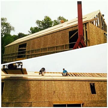 People from Herlihy Construction helped with roofing at Habitat Bergen's current house.