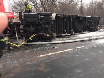 A stretch of I-84 in Dutchess remains closed around noontime following an early morning rollover collision involving a tractor-trailer Tuesday.