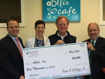 Richard Evanko, vice president of First County Bank, Nancy Heller, Abilis director of development, Dennis Perry, Abilis president/CEO and Jeff Robinson, First County Bank Greenwich branch manager participated in the recent check presentation.