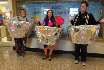 Bloomingdale teachers hold "buckets of kindness."