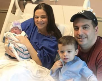 Danielle and Jeff Guido pose with their children, Gia Rose and Joey.