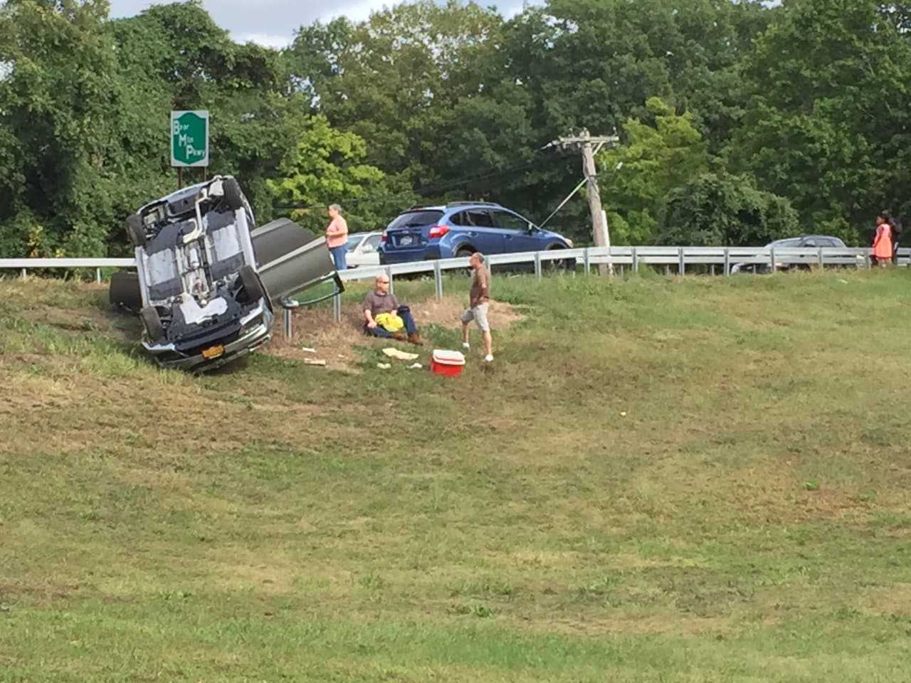 A car rolled over on Route 6 on the Bear Mountian Parkway.