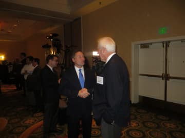 Westchester County Executive Rob Astorino speaks to a guest at Thursday's annual breakfast of the Westchester County Association in Tarrytown.