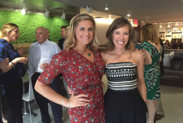 The Granola Bar's Julie Mountain and Dana Noorily pose for a photo in their new Greenwich location. The eatery has an existing location in Westport.