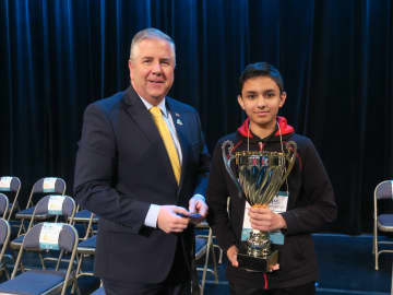 Aritra Banerjee, a seventh grader at Bridgewater-Raritan Regional Middle School, with Somerset County Freeholder Brian Gallagher.