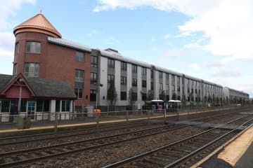 The luxury apartment building was built next to the Waldwick train station.