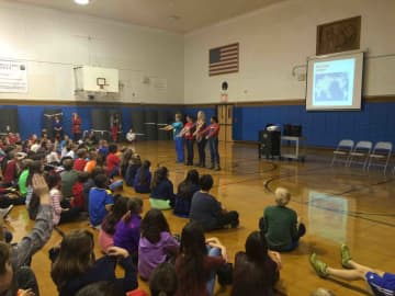 Parent Jen Argenta recently spoke with sixth- graders about the Neolithic area during an interactive presentation.