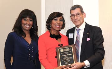 Andrea Thompson receives her "Woman of the Year" award at Teaneck Chamber of Commerce's 13th Annual Dinner last year.