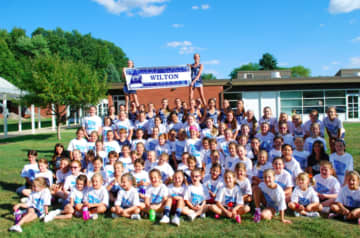 The cheerleaders of Wilton High School recently ran a cheer camp for grade school girls.