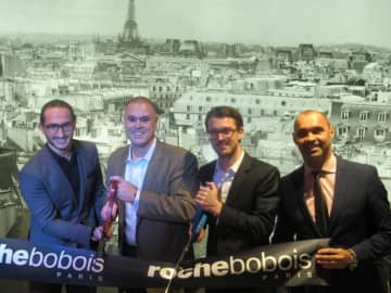 Paramus Mayor Richard LaBarbiera, second from left, with local and international representatives of Roche Bobois.