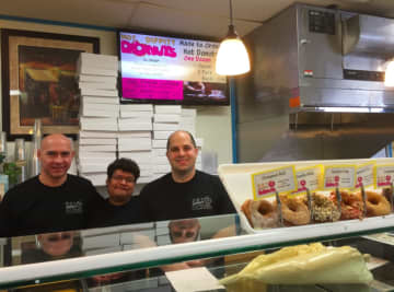 Jose Abadia, Giraldo Gil and owner Evan Liaskos at Bagels on Hudson.