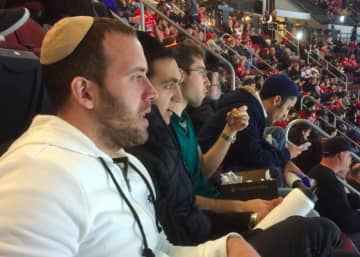 Students in the Fairleigh Dickinson University Yeshiva Program attend a New Jersey Devils game Tuesday night.