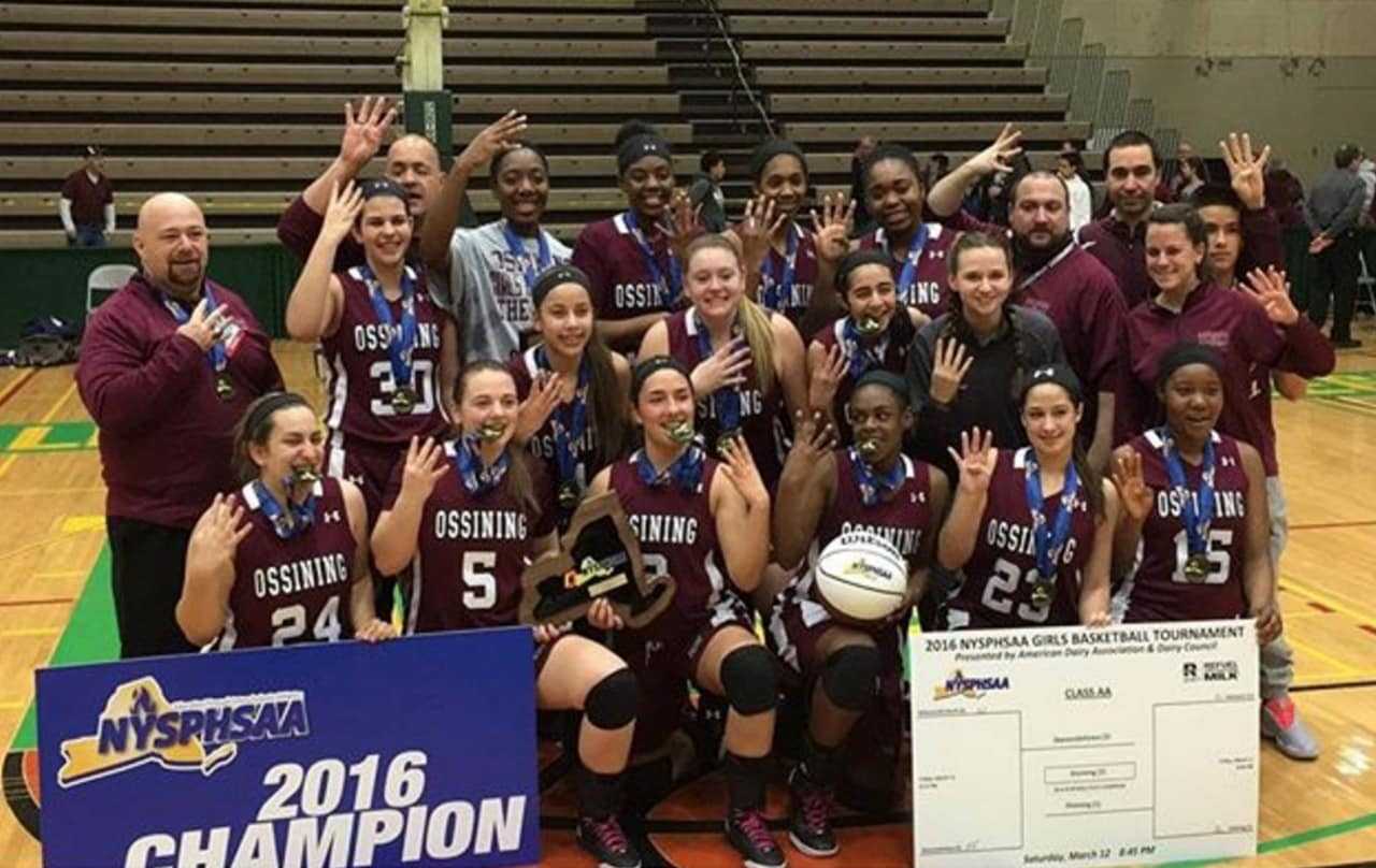 Ossining High School's girls basketball team celebrates its fourth straight NYSPHSAA title.
