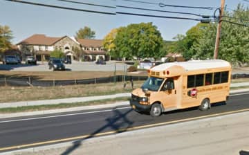 A school bus makes its way to Arlington High School.