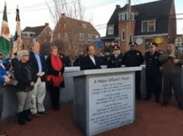 Bridgeport Mayor Joe Ganim dedicates a section of James Street as Officer Gerald T. DiJoseph Way.