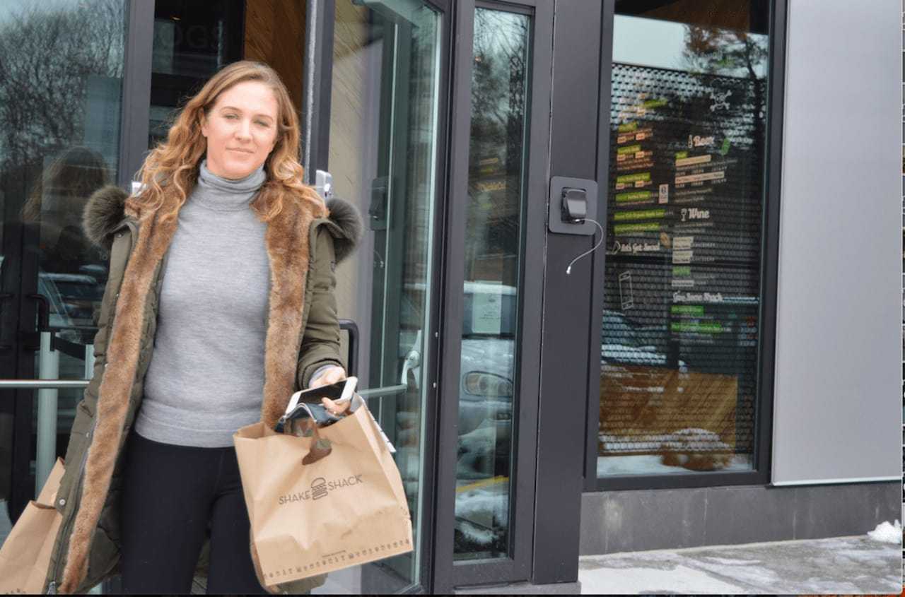 Kristen Geisler gets takeout from the new Darien Shake Shack.