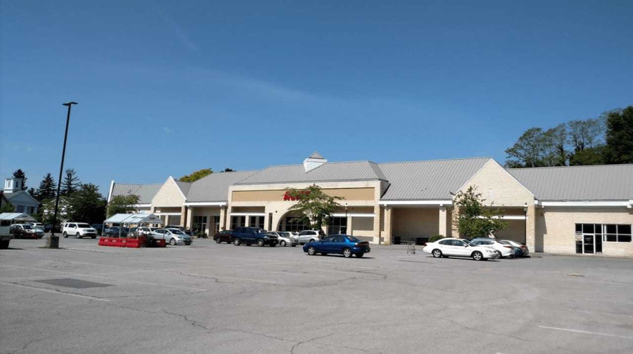 Two men were arrested after being busted with drugs while drinking in the Acme Plaza parking lot on North Avenue.