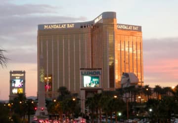 A gunman shooting from the 32nd floor of the Mandalay Bay Hotel on the Las Vegas Strip shot and killed more than 50 people and injured at least 200 at a country music concert Sunday night.