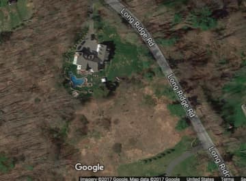 The body was discovered by a homeowner at 496 Long Ridge Road in Pound Ridge.