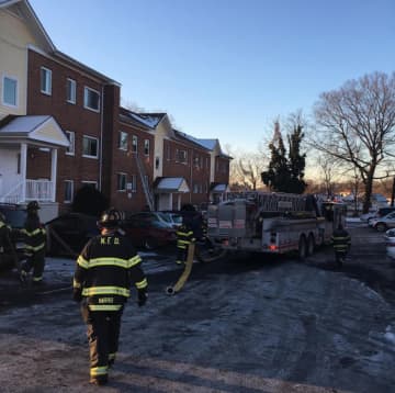 <p>Norwalk firefighters make quick work of a fire at Carlton Court on Wednesday morning.</p>