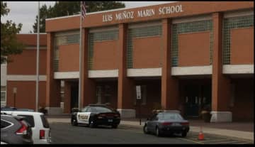 A man was found shot to death outside the Luis Munoz Marin School.
