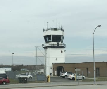 A small plane hit a runway light during a training flight at Hudson Valley Regional Airport.