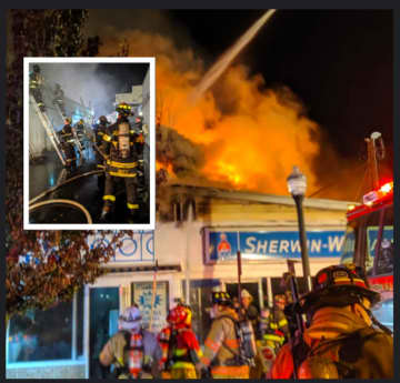 Firefighters battle a blaze late Monday evening in Washington Borough, Warren County.