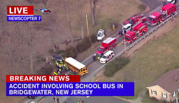 Three people were hospitalized in a crash involving two cars and a school bus Thursday in Bridgewater, reports say.