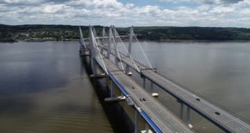 A woman was saved by a Good Samaritan and a tow truck driver after attempting to jump from the new Tappan Zee Bridge.