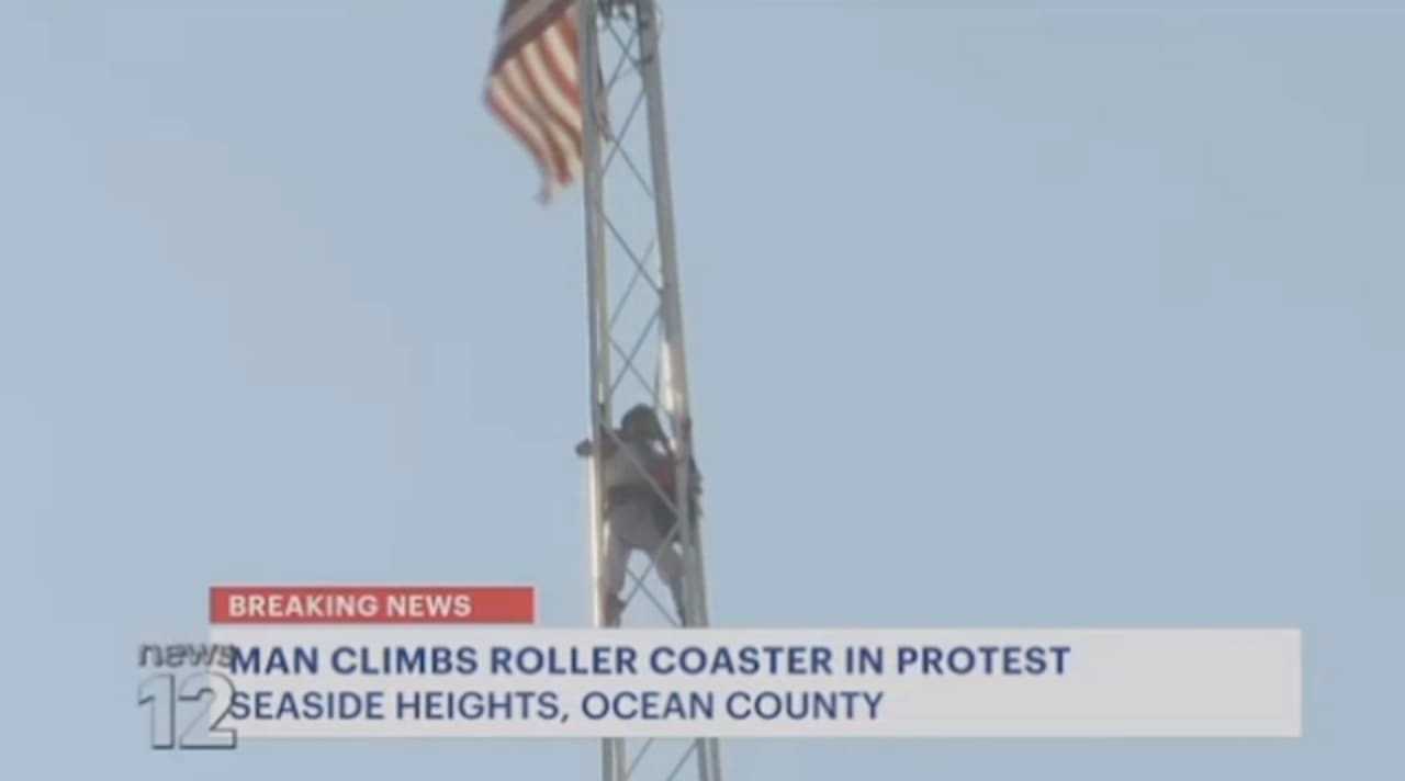 Man named "Chris" atop Casino Pier "Skyscraper" tower ride at Casino Pier in Seaside Heights.