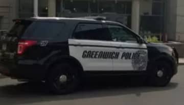 Greenwich Police arrested a New York woman for allegedly shoplifting nearly $200 in seafood from an area grocery store.