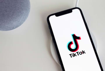 The TikTok app loading on a cellphone.
