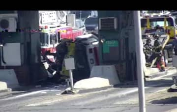 An ambulance overturned at the Essex County Toll Plaza Thursday morning, June 1 on the Garden State Parkway.