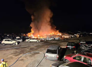 Firefighters responded to a report of a parking lot full of cars on fire Saturday, Sept. 5.