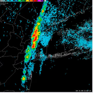A radar image by the National Weather Service shows severe storms (in orange and yellow) early Saturday evening, April 22.