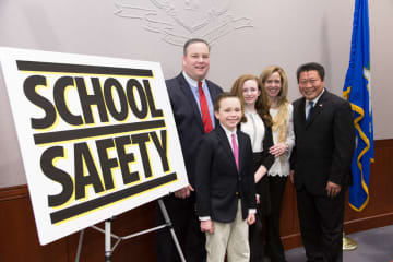 Sen. Tony Hwang (right) was joined by the Reidy family of Newtown on Feb. 26 at the State Capitol to raise awareness about the need for safe schools legislation in Connecticut. Safe Schools legislation has been approved by the state legislature.