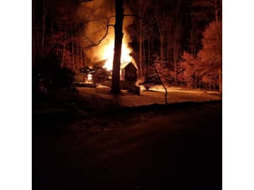 <p>The fire fully engulfed the house on 12 Hickory Road in Somers.</p>