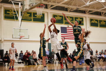 Sydney Lowery puts up a shot for the St. Luke's girls team.